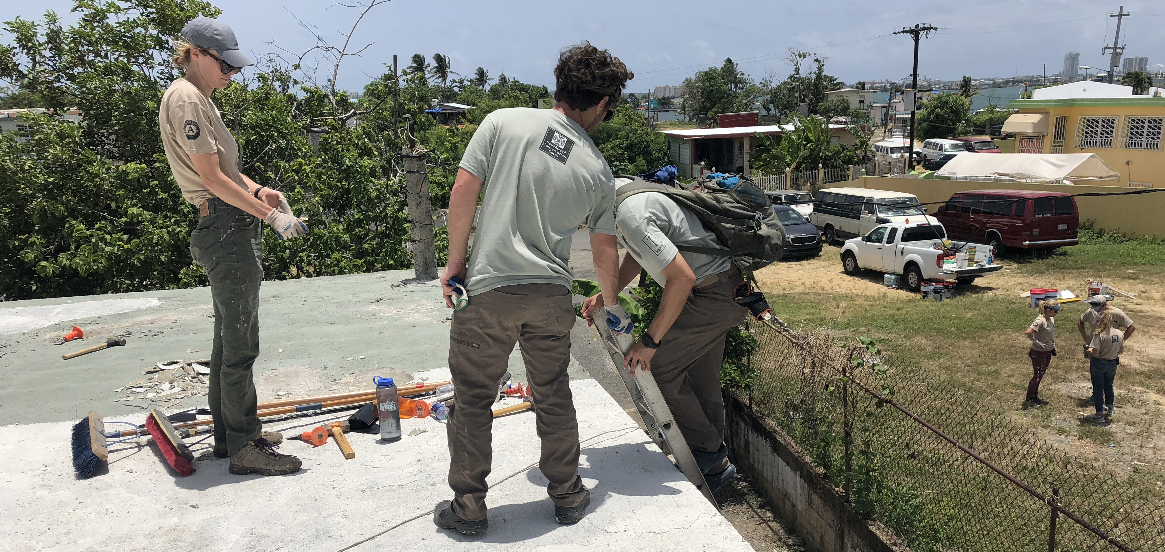 Crew members working on a roof in Puerto Rico